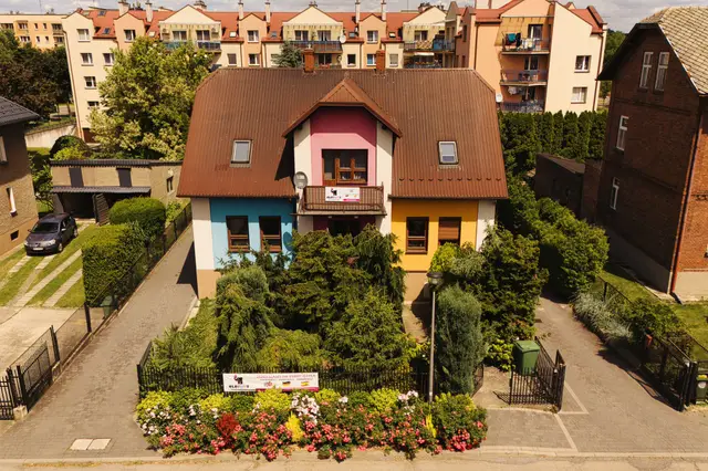 The Chill Den house with its colourful facade and garden at Kalicińskiego 4, Oświęcim